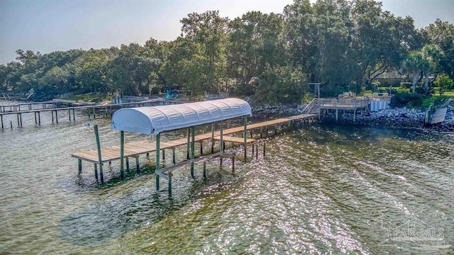 dock area featuring a water view