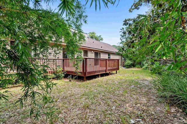 view of yard with a wooden deck