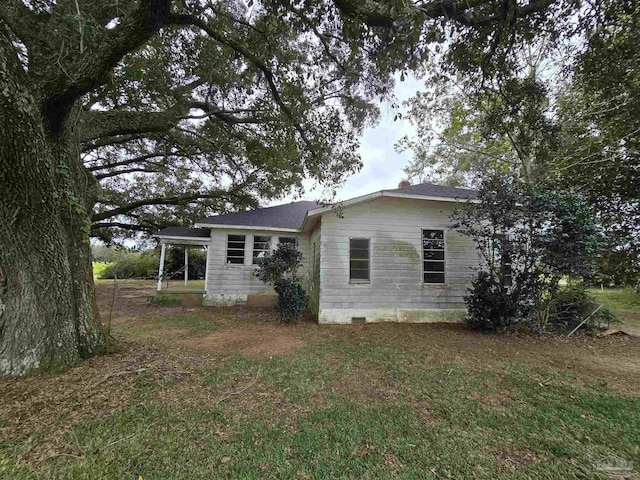 exterior space with a lawn