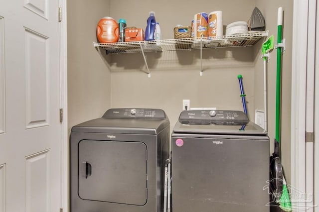 laundry area with washer and dryer and laundry area