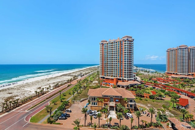 bird's eye view with a beach view and a water view