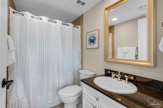 full bathroom featuring vanity, shower / tub combo, and toilet