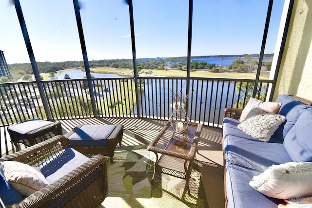 645 Lost Key Dr Unit 406D, Perdido Key, FL 32507 - sunroom featuring an outdoor living space and a water view