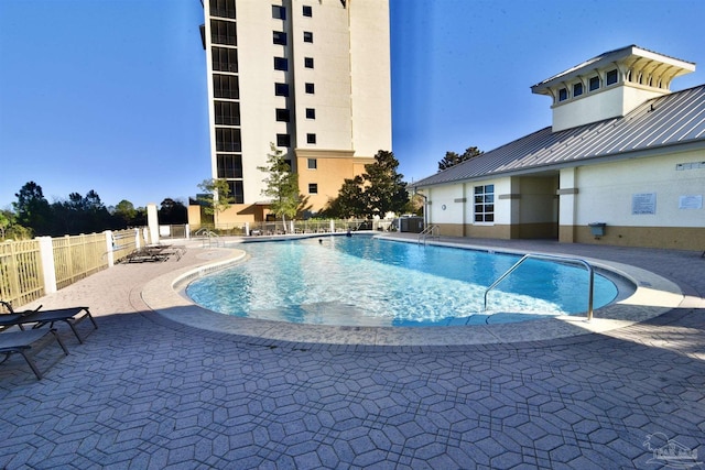 645 Lost Key Dr Unit 406D, Perdido Key, FL 32507 - pool featuring fence and a patio