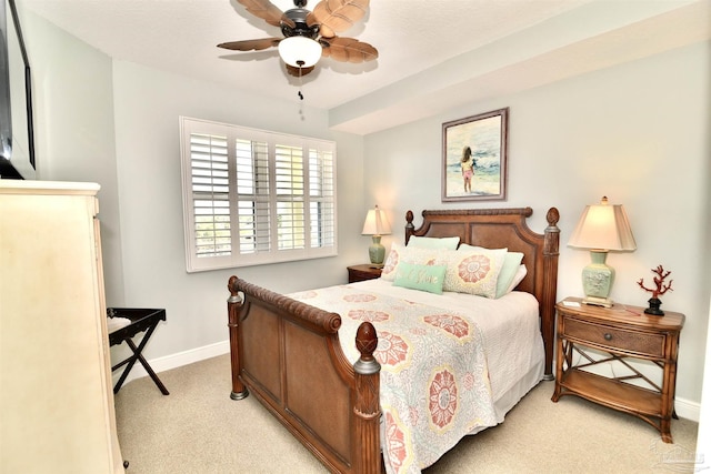 645 Lost Key Dr Unit 406D, Perdido Key, FL 32507 - bedroom featuring baseboards, light colored carpet, and ceiling fan
