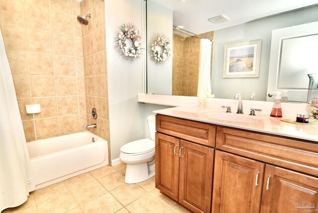 645 Lost Key Dr Unit 406D, Perdido Key, FL 32507 - full bathroom with tile patterned floors, shower / bathtub combination with curtain, visible vents, toilet, and vanity