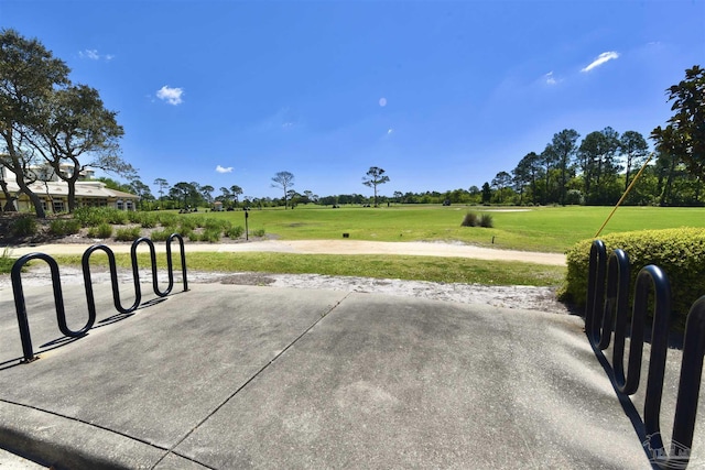 645 Lost Key Dr Unit 406D, Perdido Key, FL 32507 - view of property's community featuring a yard and golf course view