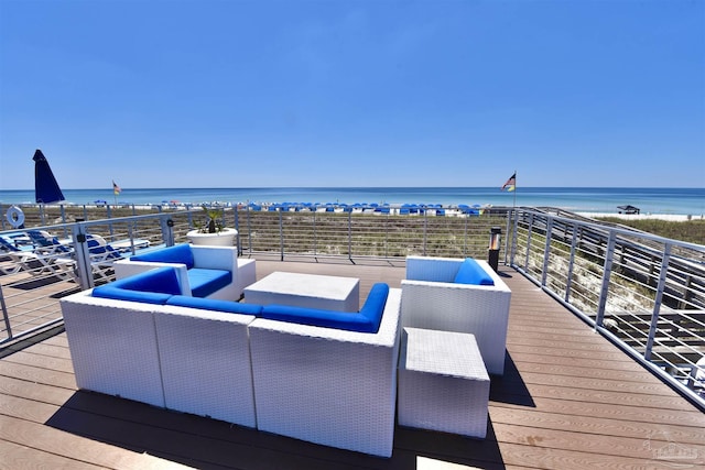 645 Lost Key Dr Unit 406D, Perdido Key, FL 32507 - wooden deck with an outdoor living space and a water view