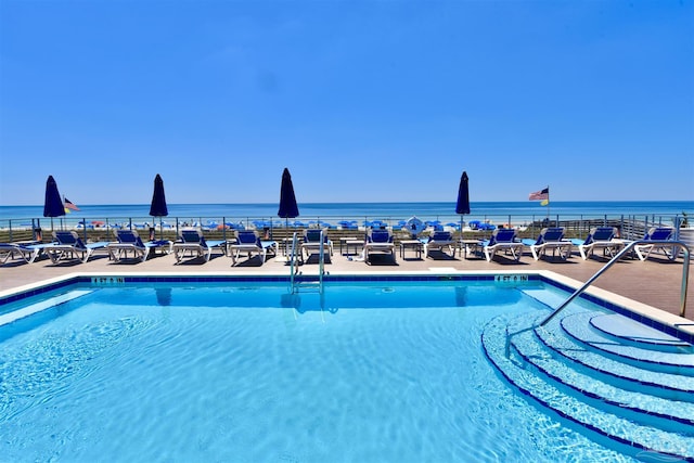 645 Lost Key Dr Unit 406D, Perdido Key, FL 32507 - community pool featuring a water view, fence, and a patio