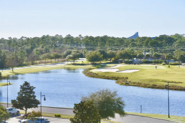 645 Lost Key Dr Unit 406D, Perdido Key, FL 32507 - property view of water featuring a wooded view and view of golf course