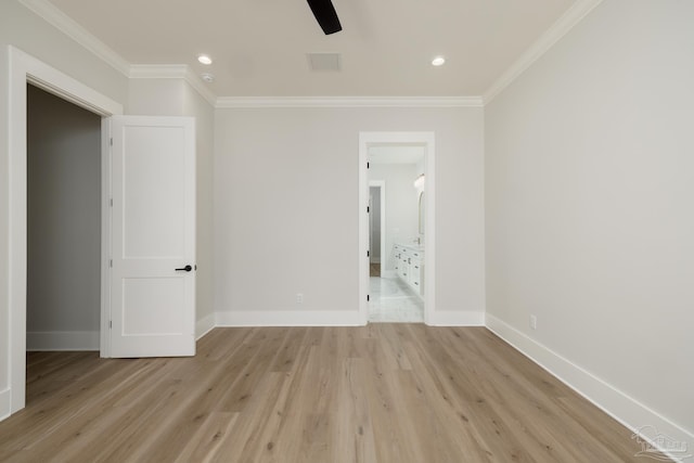 unfurnished bedroom featuring crown molding, connected bathroom, ceiling fan, and light hardwood / wood-style floors