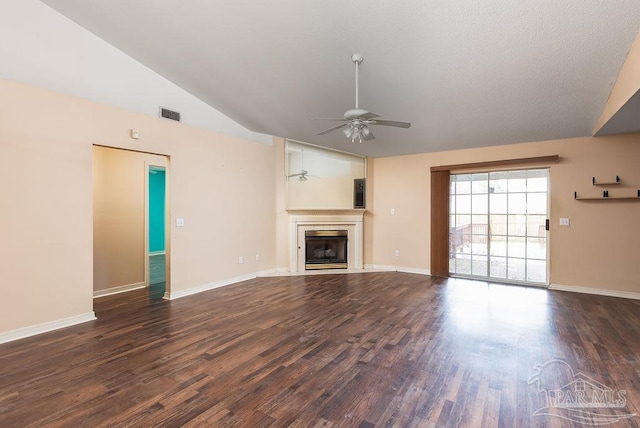 unfurnished living room featuring ceiling fan, lofted ceiling, and dark hardwood / wood-style flooring