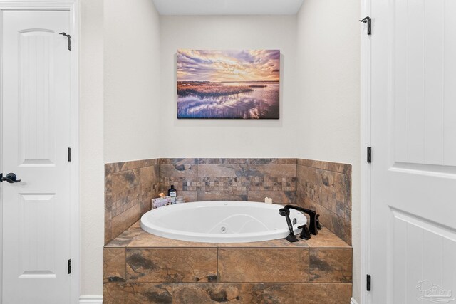 bathroom featuring a jetted tub