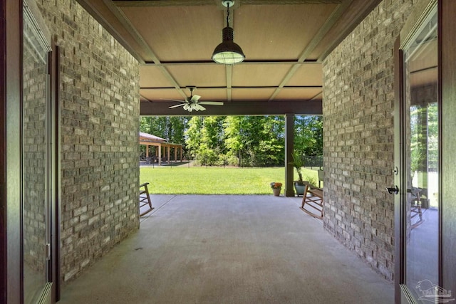 view of patio with ceiling fan