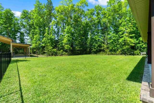 view of yard featuring a fenced backyard