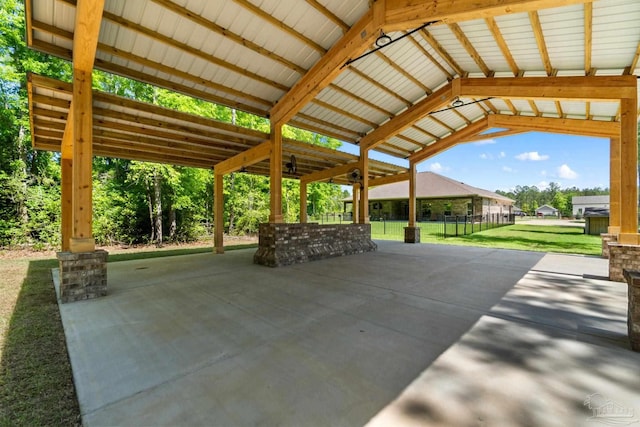 view of patio featuring fence