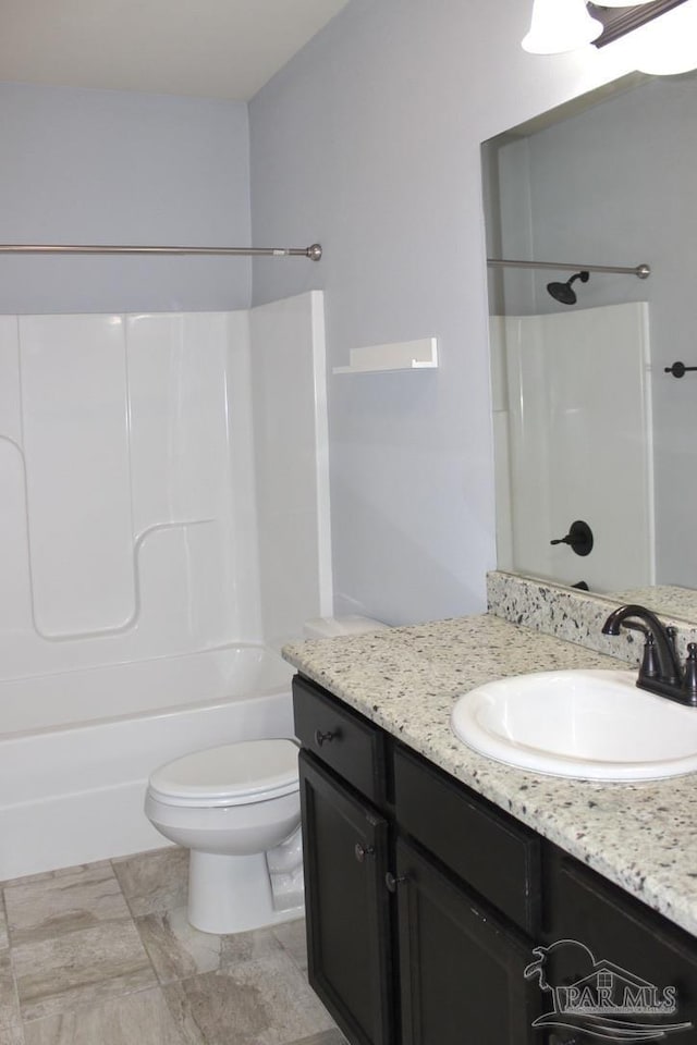 full bathroom featuring vanity, toilet, and bathing tub / shower combination