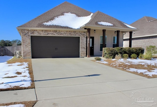 view of front of property featuring a garage