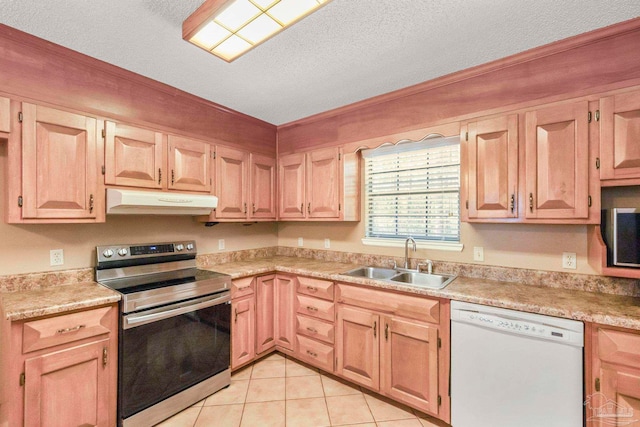 kitchen with stainless steel electric range oven, sink, white dishwasher, a textured ceiling, and light tile patterned flooring