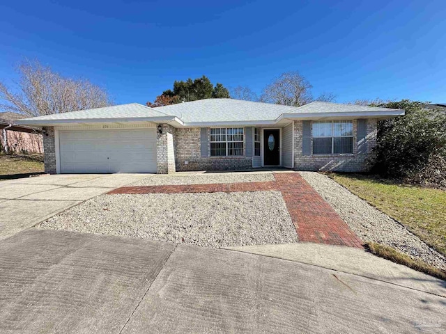 single story home with a garage