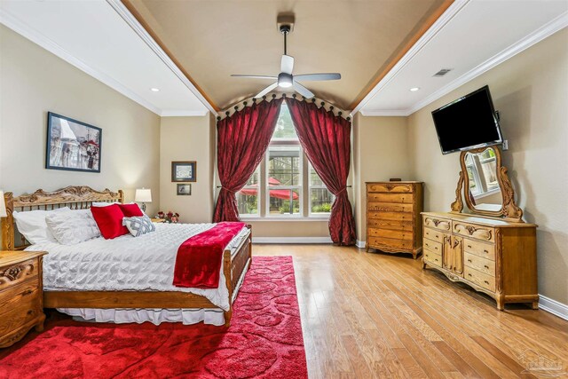 2882 Tunnel Rd, Pace, FL 32571 - bedroom with wood finished floors, lofted ceiling, ornamental molding, and a ceiling fan