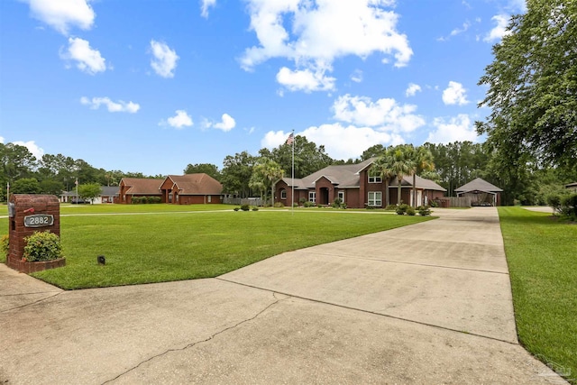 2882 Tunnel Rd, Pace, FL 32571 - view of front of home with a front yard and concrete driveway