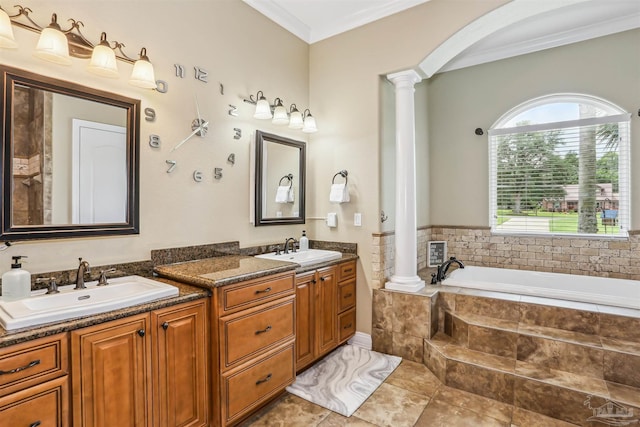 2882 Tunnel Rd, Pace, FL 32571 - bathroom featuring ornate columns, double vanity, a bath, and ornamental molding