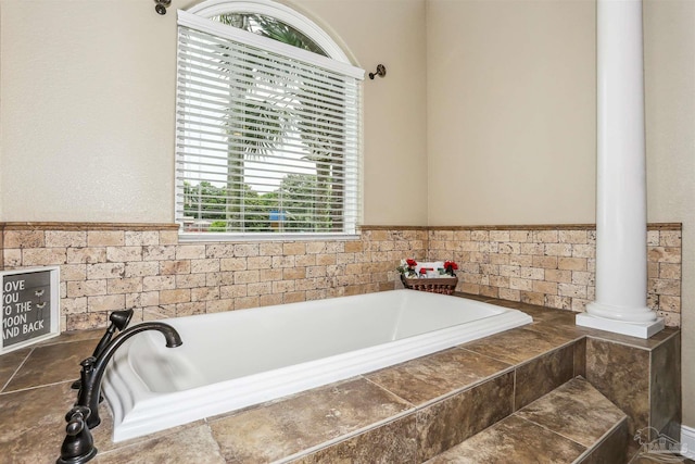 2882 Tunnel Rd, Pace, FL 32571 - full bath with healthy amount of natural light and a garden tub