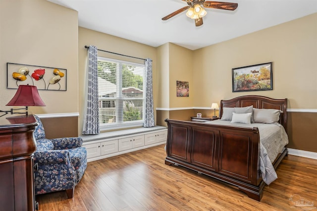 2882 Tunnel Rd, Pace, FL 32571 - bedroom featuring light wood-type flooring and ceiling fan