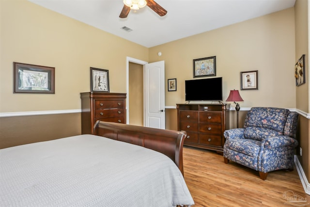 2882 Tunnel Rd, Pace, FL 32571 - bedroom with light wood-type flooring and a ceiling fan