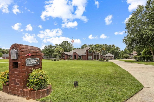 2882 Tunnel Rd, Pace, FL 32571 - view of front of home with a front lawn and driveway