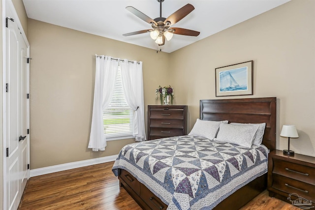 2882 Tunnel Rd, Pace, FL 32571 - bedroom featuring wood finished floors and ceiling fan