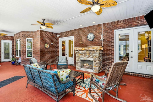 2882 Tunnel Rd, Pace, FL 32571 - view of patio / terrace featuring french doors, a ceiling fan, and an outdoor living space with a fireplace