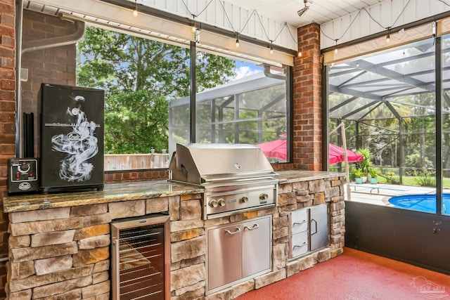 2882 Tunnel Rd, Pace, FL 32571 - view of patio / terrace with wine cooler, an outdoor kitchen, and glass enclosure