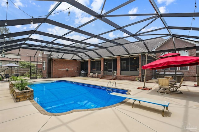 2882 Tunnel Rd, Pace, FL 32571 - outdoor pool with entry steps, a patio area, a diving board, and glass enclosure