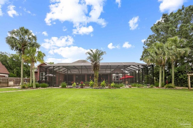 2882 Tunnel Rd, Pace, FL 32571 - back of house with a lanai