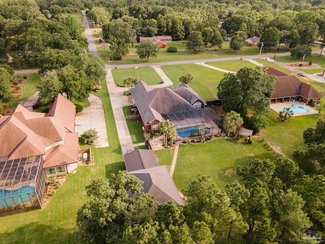 2882 Tunnel Rd, Pace, FL 32571 - bird's eye view of a pool and a heavily wooded area