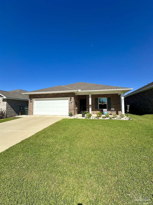 2656 Avalon St, Cantonment, FL 32533 - ranch-style home with concrete driveway, brick siding, a front yard, and a garage