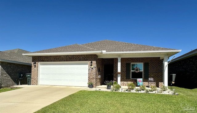 2656 Avalon St, Cantonment, FL 32533 - ranch-style home featuring an attached garage, a porch, driveway, and brick siding