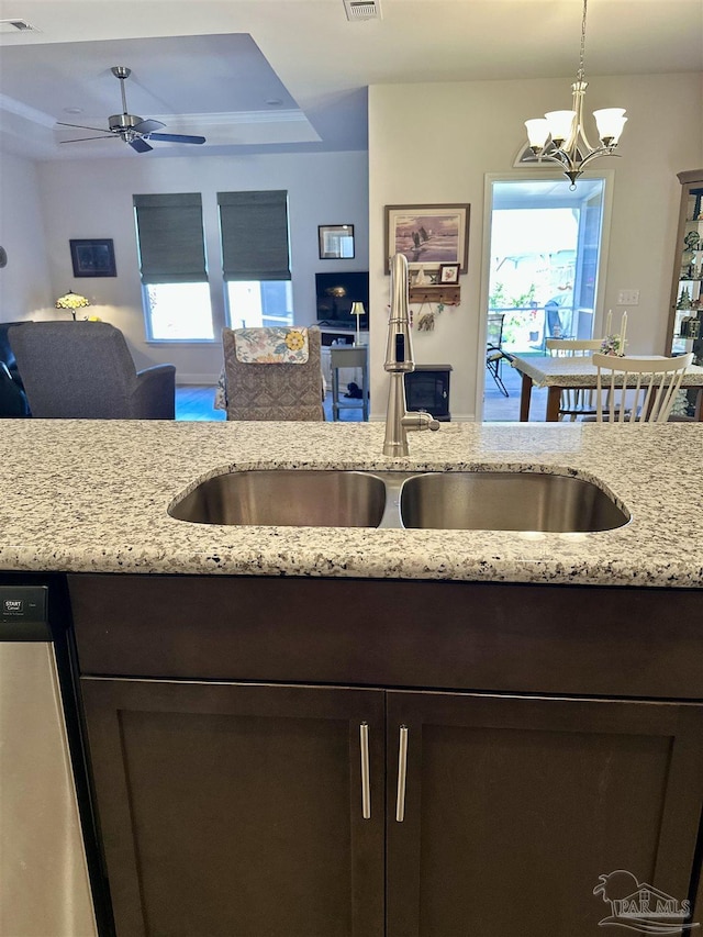 2656 Avalon St, Cantonment, FL 32533 - kitchen featuring a sink, visible vents, stainless steel dishwasher, and dark brown cabinets