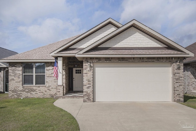 view of front of home with a garage, a shingled roof, concrete driveway, a front lawn, and brick siding