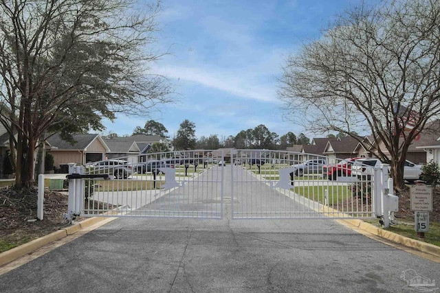 view of gate featuring a residential view