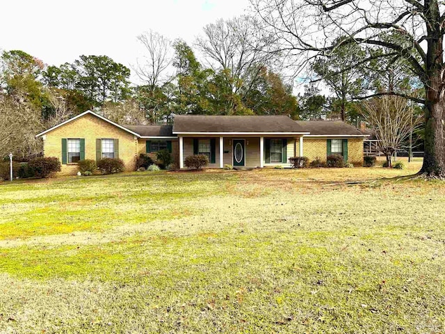 ranch-style home with a front lawn