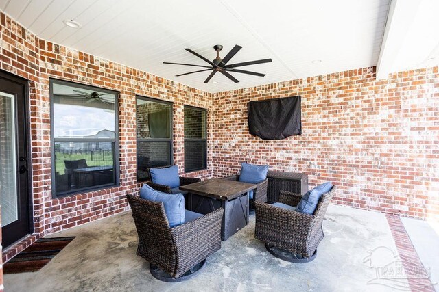 view of patio with ceiling fan