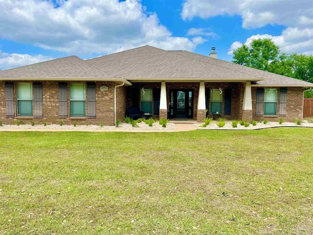 2924 Sundance Ln, Cantonment, FL 32533 - view of front of house featuring a front lawn and brick siding