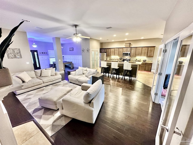 2924 Sundance Ln, Cantonment, FL 32533 - living room with dark wood-style floors, recessed lighting, and a ceiling fan