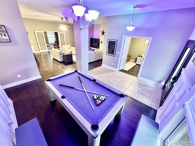 2924 Sundance Ln, Cantonment, FL 32533 - game room with wood finished floors, billiards, and a chandelier