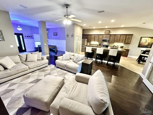 2924 Sundance Ln, Cantonment, FL 32533 - living area with ceiling fan, recessed lighting, light wood-style floors, and vaulted ceiling
