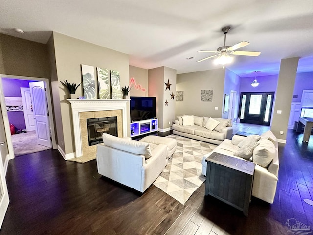 2924 Sundance Ln, Cantonment, FL 32533 - living room featuring wood finished floors, a ceiling fan, and a fireplace