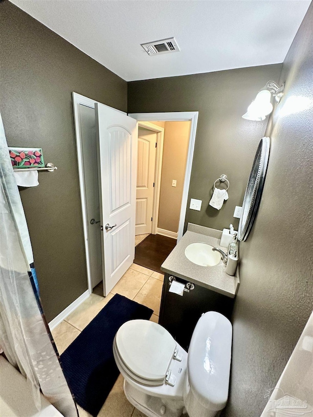 2924 Sundance Ln, Cantonment, FL 32533 - bathroom with vanity and tile patterned flooring